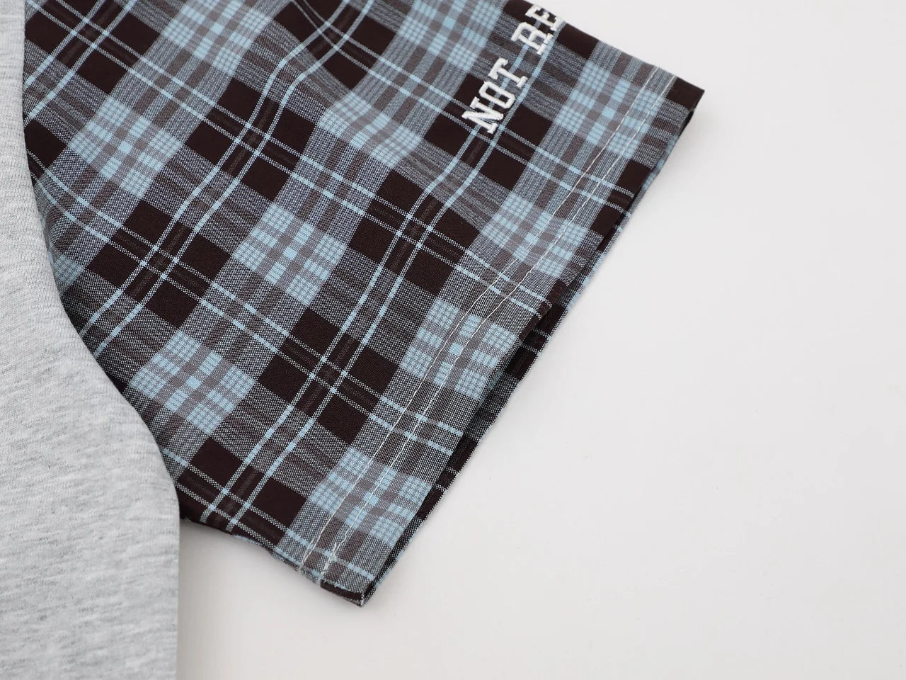 "XX" Plaid Sleeve Polo Shirt