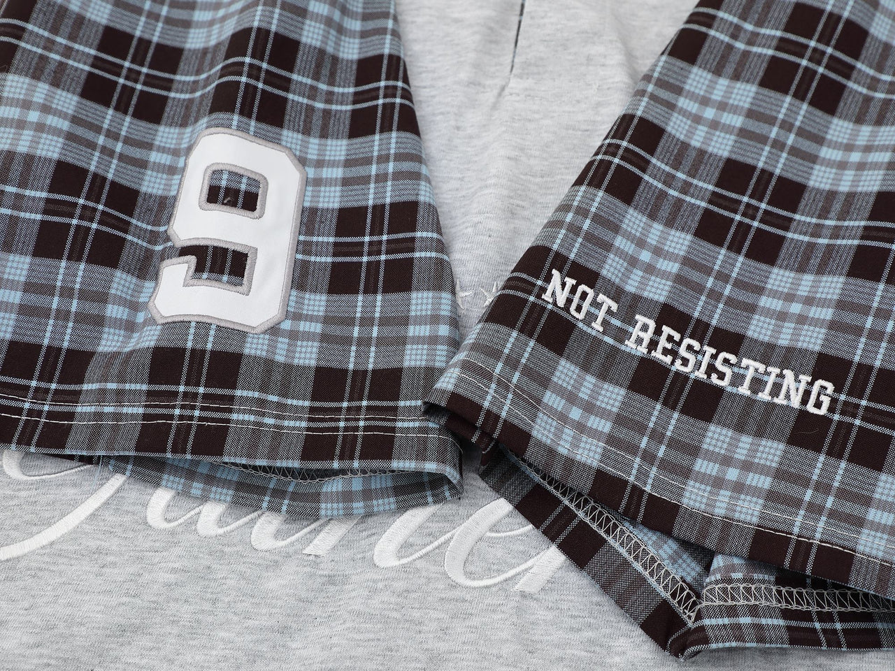 "XX" Plaid Sleeve Polo Shirt